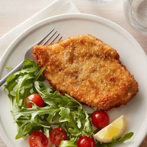 Chicken Schnitzel And Salad On Plate