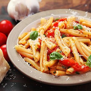 Plate Of Pasta With Tomato and Basil