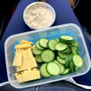 Cucumber slices & cheese in a container